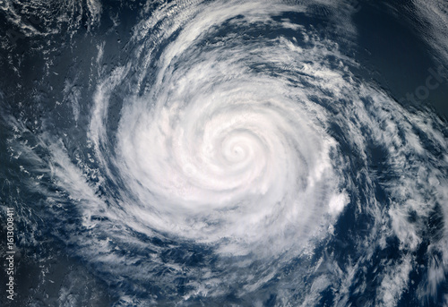 Fototapeta Naklejka Na Ścianę i Meble -  Super Typhoon, tropical storm, cyclone, hurricane, tornado, over ocean. Weather background. Typhoon,  storm, windstorm, superstorm, gale moves to the ground.  Elements of this image furnished by NASA.