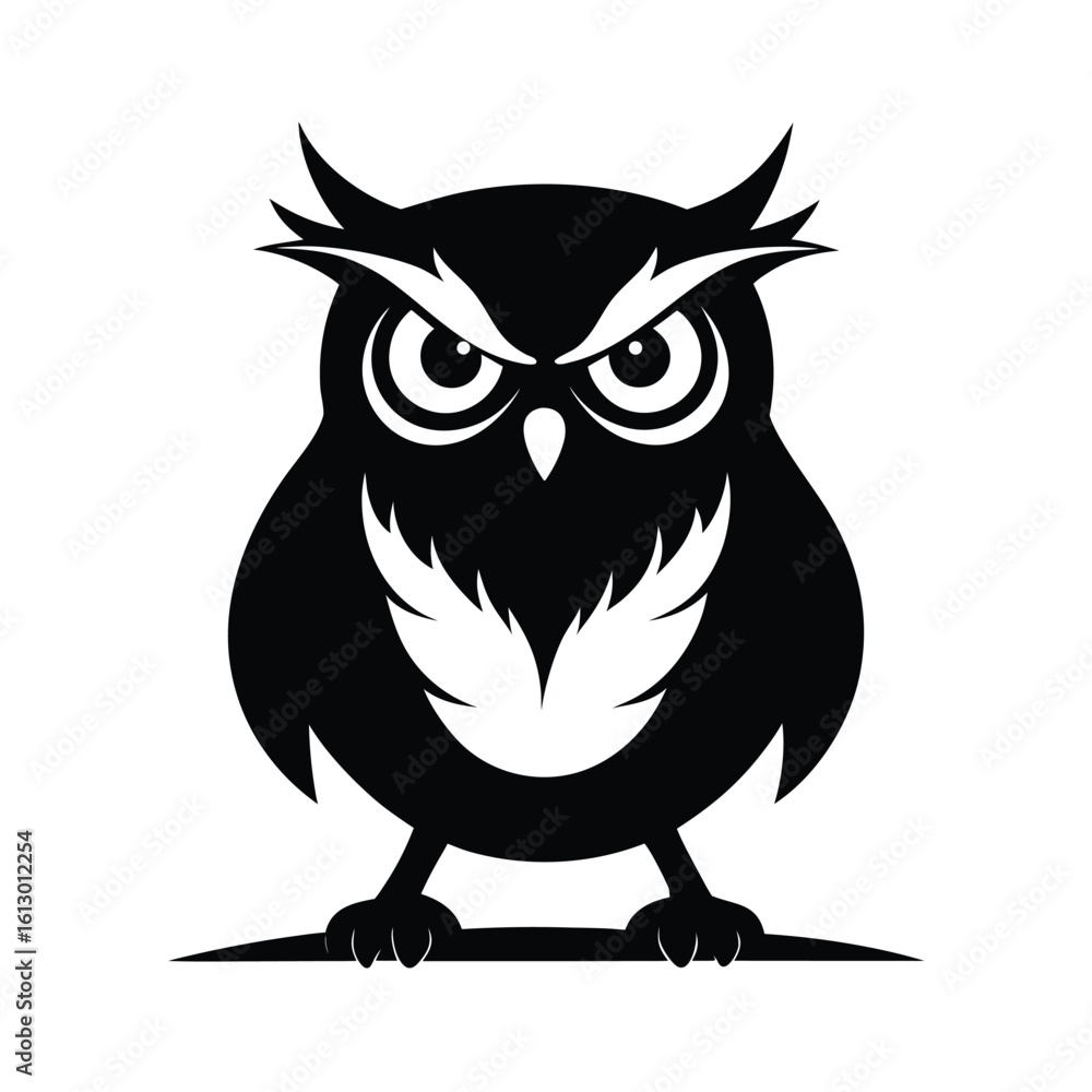 Fototapeta premium Striking black silhouette of an owl with intense piercing eyes perched majestically