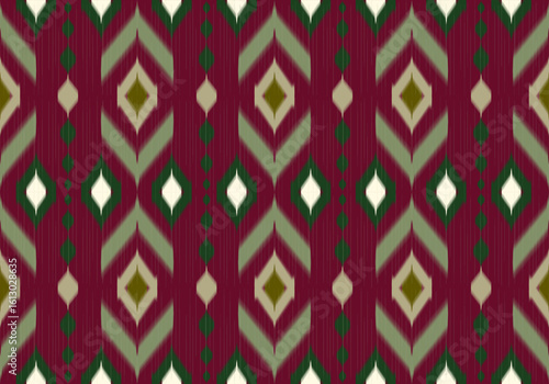 This seamless ikat pattern features bold maroon and green chevron diamonds with earthy tones and blurred edges, giving a traditional, handcrafted textile feel with modern symmetry.