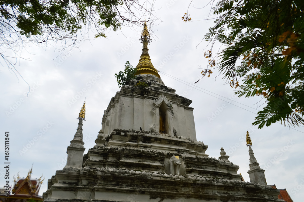 Naklejka premium White Pagoda, Lanna Architecture, Symbols of Buddhism, South East Asia at Wat Chang Kam or Wat Kan Thom, Wiang Kum Kam Chiang Mai, Northern Thailand