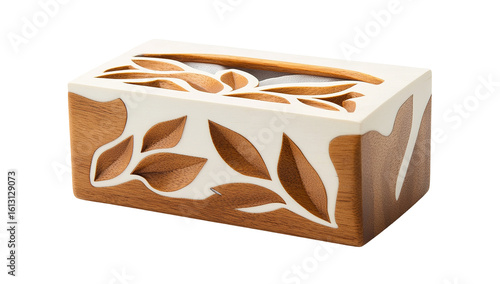 Hand pulling tissue from black box on white table