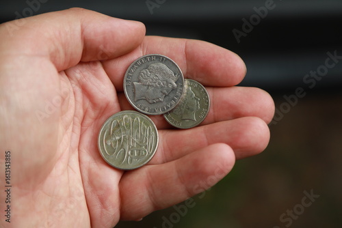 Australian change coins in hand