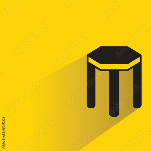 stool icon with shadow on yellow background