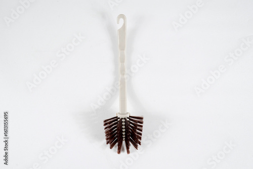 Scoop and brush cleaning kit isolated on white background
