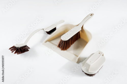 Scoop and brush cleaning kit isolated on white background