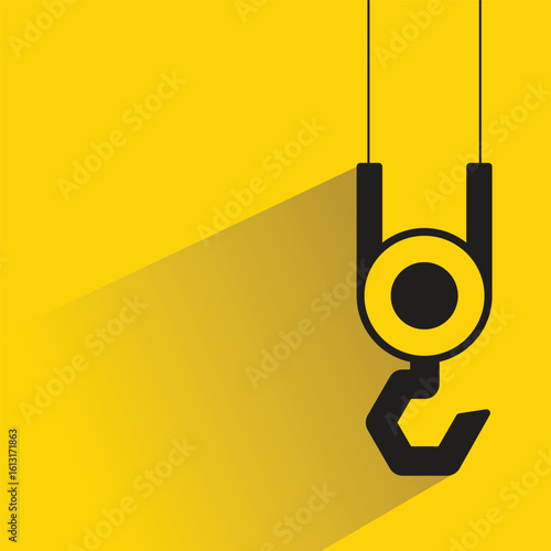 hoist and hook icon with drop shadow on yellow background