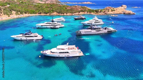 Island La Maddalena. Sardinia, Italy. Beaches of Sardinia. Boats and yachts. Incredible colors and views. Drone view. View from above. Drone view of Sardinia. High resolution video.