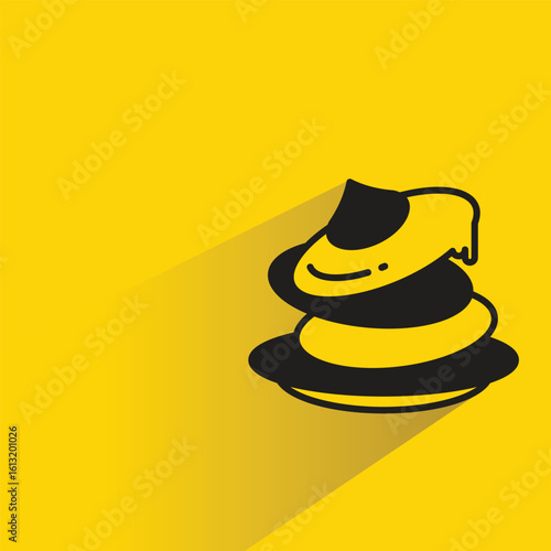 cake icon with shadow on yellow background