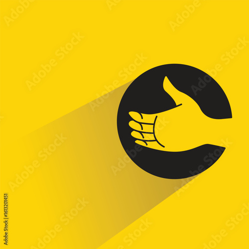 hand gesture in circle icon with shadow yellow background
