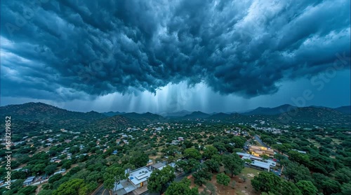 Dramatic Storm Cell Over Lush Village