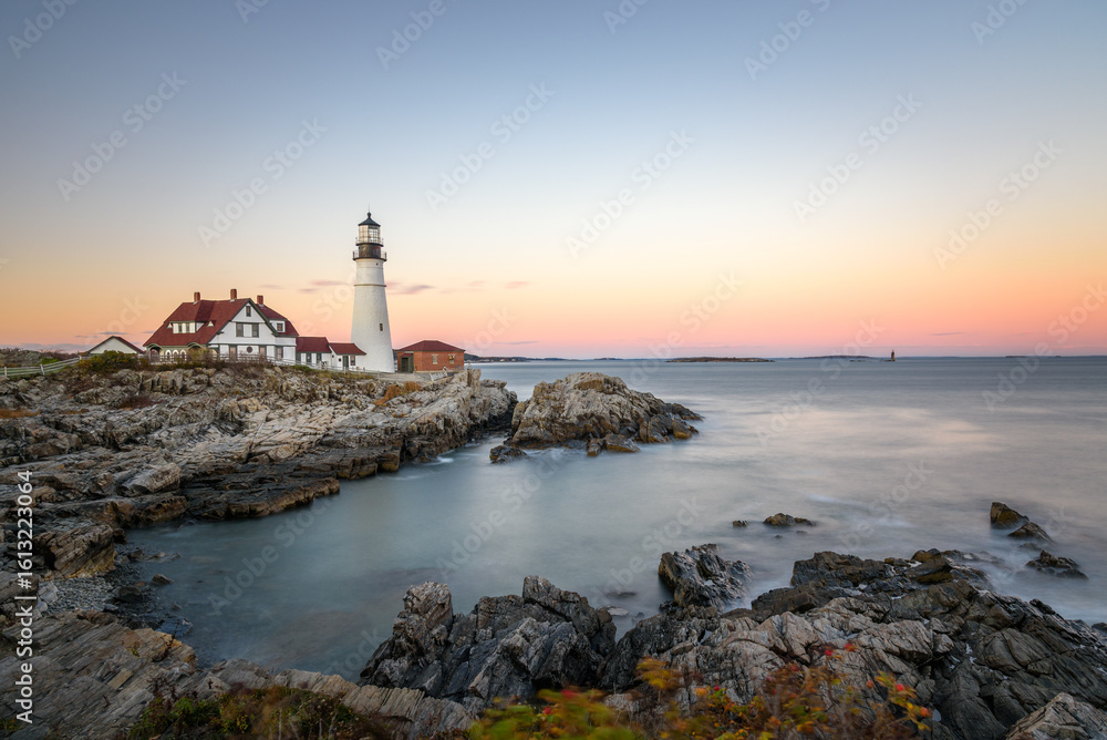 Naklejka premium Majestic view of Portland Head Lighthouse under clear sky at dusk in autumn. Long exposure.Cape Elizabeth, Portland, ME, USA.