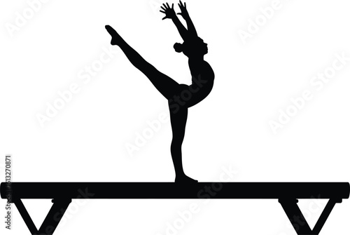 Graceful female gymnast performing a dynamic pose on a balance beam in silhouette