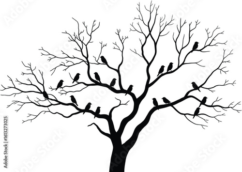 Spooky bare tree with crows perched on branches in a dramatic silhouette