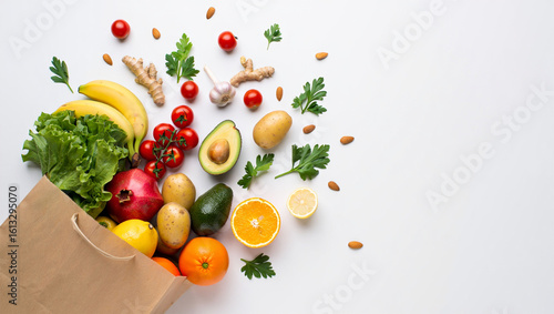 Fresh Organic Groceries in Paper Bag with Healthy Fruits and Vegetables on White Background