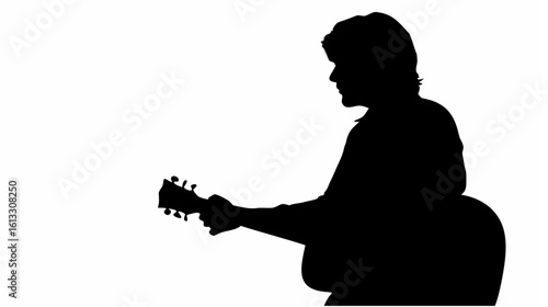 Silhouette of a musician playing an acoustic guitar in a side profile against a white background space