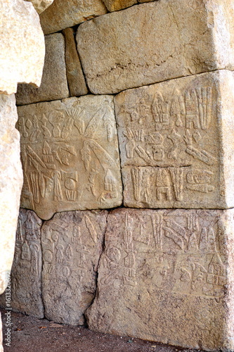 TURKIYE,HATTUSA,02-03-2024.It was the capital of the Hittite Empire. The earliest traces of settlement on the site are from the sixth millennium BC.In the photo ,Reliefs,Hieroglyphs ,writin