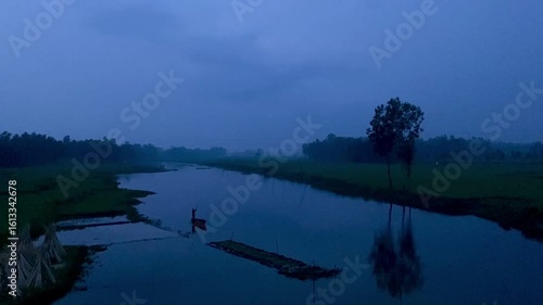 Evening on the lake with cloudy weather and boat floating 