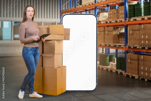 Woman warehouse manager. Sm...