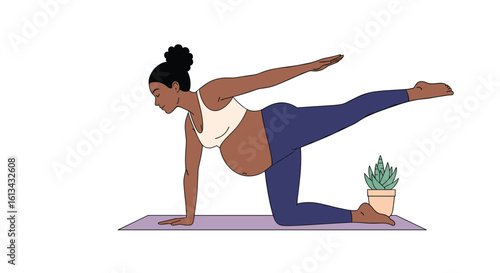 Pregnant woman practicing yoga on a mat in a studio stretching her body and improving her core strength for a healthy pregnancy