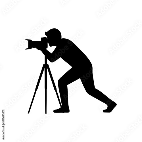 Silhouette of a Photographer Taking Photos with Camera on Tripod Against White Background