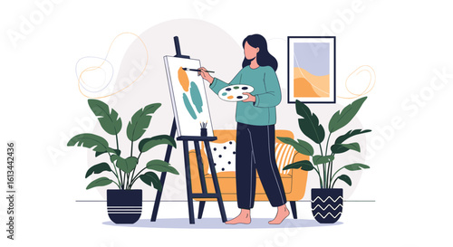 A talented artist skillfully creates her next masterpiece painting with vibrant colors on canvas