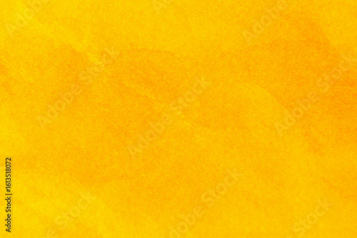 Abstract bright texture of yellow paint background.