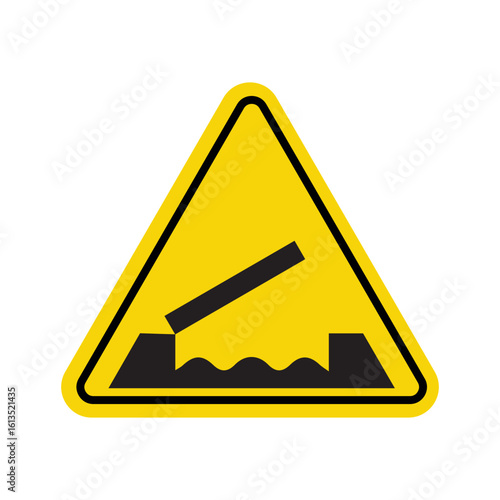 Yellow triangular warning sign for uneven road with broken pavement ahead
