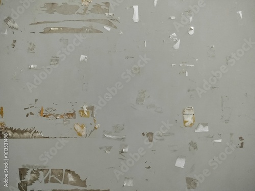 Foto sticker residue stuck to the wall