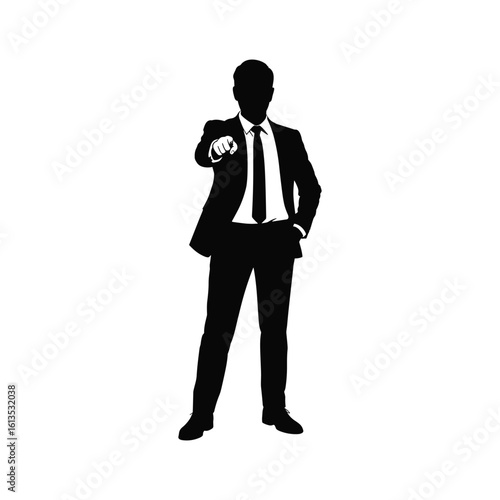 Silhouette of a businessman pointing forward with confidence