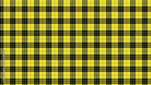 Detailed view of a yellow and black plaid pattern with thin red lines crossing the yellow squares