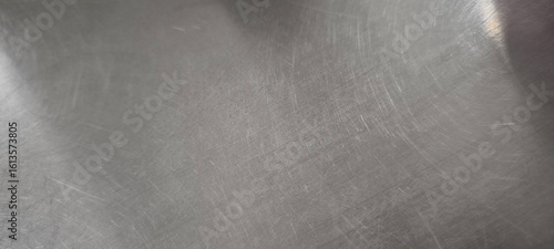 The table surface is made of stainless steel.