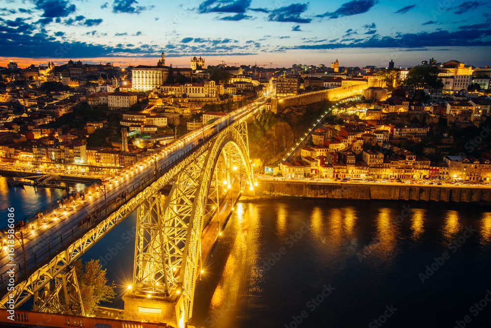 Fototapeta premium Night View of Dom Luis I Bridge and Illuminated Cityscape of Porto, Portugal