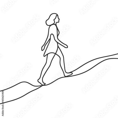 Woman walking hillside landscape