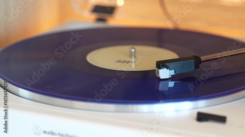 turntable with vinyl record. playing music