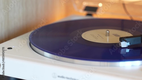 turntable with vinyl record. playing music