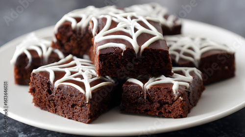 Wallpaper Mural Perfectly Crafted Brownie Pieces with Spiderweb Piping on a Plate for Dessert Delight Torontodigital.ca