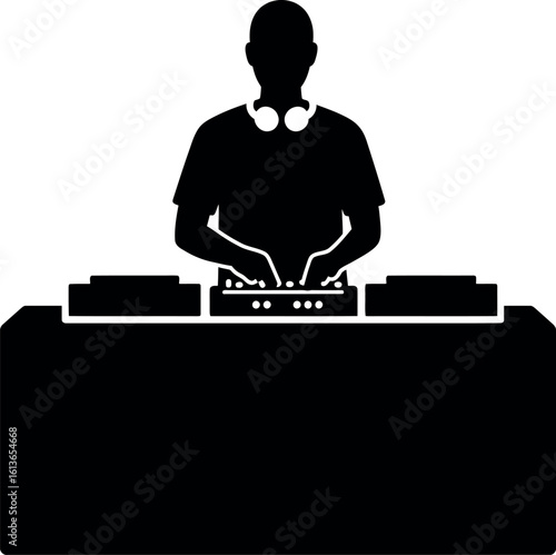Silhouette dj with headphones at turntables