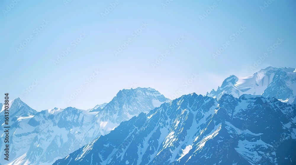 Obraz premium Scenery of the Blue Snow Mountain Range,panoramic view of the Alps—Towering Peaks in Azure Tones, Snow-Capped Summits & Vast Landscapes, Nature’s Breathtaking Alpine Canvas.