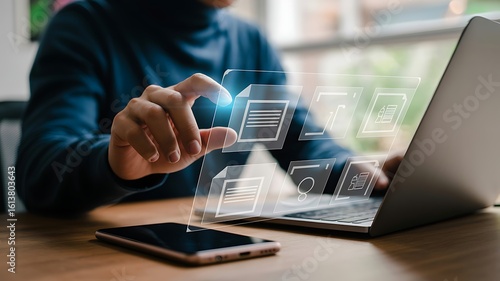 Person interacting with digital document interface on screen