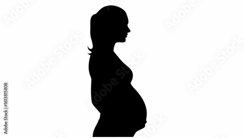 Silhouette of a pregnant woman standing in profile with her hair up in a ponytail against white background