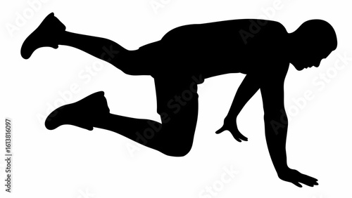 Silhouette of a person in a dynamic pose with one leg raised and hands touching the ground for support
