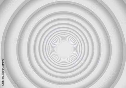 Abstract grayscale concentric circles receding into a bright center, creating an illusion of depth and a tunnel-like perspective.