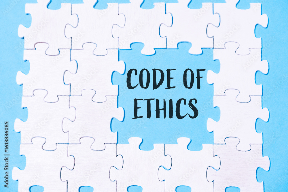 Puzzle pieces forming a message about ethics on a blue background with a focus on integrity Puzzle pieces forming a message about ethics on a blue background with a focus on integrity