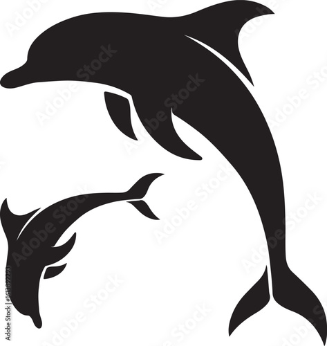 Silhouette of two dolphins leaping in the water