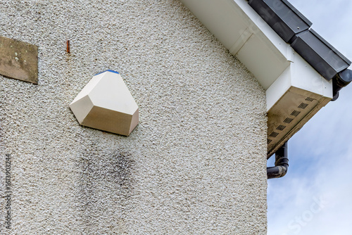Tableau sur toile Home security alarm box on exterior wall of residential house
