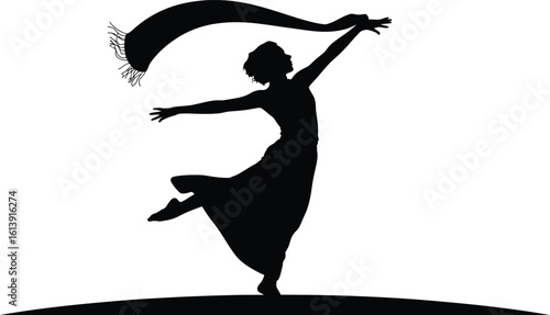 Silhouette of a dancer with a flowing scarf dancing