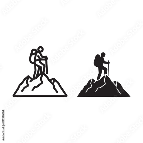 Climber reaching mountain summit with trekking poles