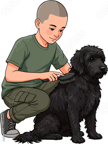 A boy happily grooming a black dog.