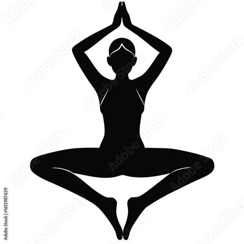 Silhouette of woman in yoga pose meditation