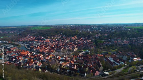 Aerial panoramic view around the old town of the city Schwäbisch Hall on a cloudy spring noon in Germany.